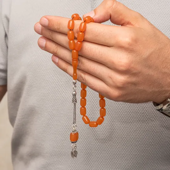 Gümüş Püsküllü Turuncu Kapsül Kesim Sıkma Kehribar Tesbih Gümüş Püsküllü Turuncu Kapsül Kesim Sıkma Kehribar Tesbih